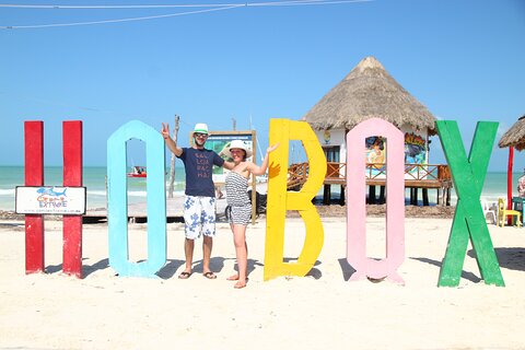 Holbox island boat trip, golf cart , beach club, pick up Cancun