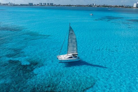 Isla Mujeres Day Tour with Catamaran, Snorkeling & Beach Club