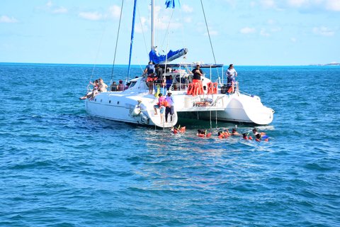 Snorkeling Catamaran to Isla Mujeres with Beach Club & Party